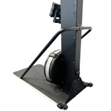 The Echo Kodiak Echo Commercial Ski Erg 02008 in black features handlebars, wheel, and a stepped base for endurance training.