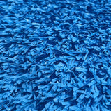 Close-up of Pro Performance 45 Sports & Fitness Turf by Athletic Textiles, showing textured blue hybrid blades.