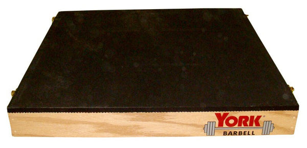 York Barbell Plyo Boxes feature a wooden platform, black top, and logo, with space for stackable plyo step-up boxes.