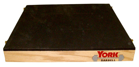 York Barbell Plyo Boxes feature a wooden platform, black top, and logo, with space for stackable plyo step-up boxes.
